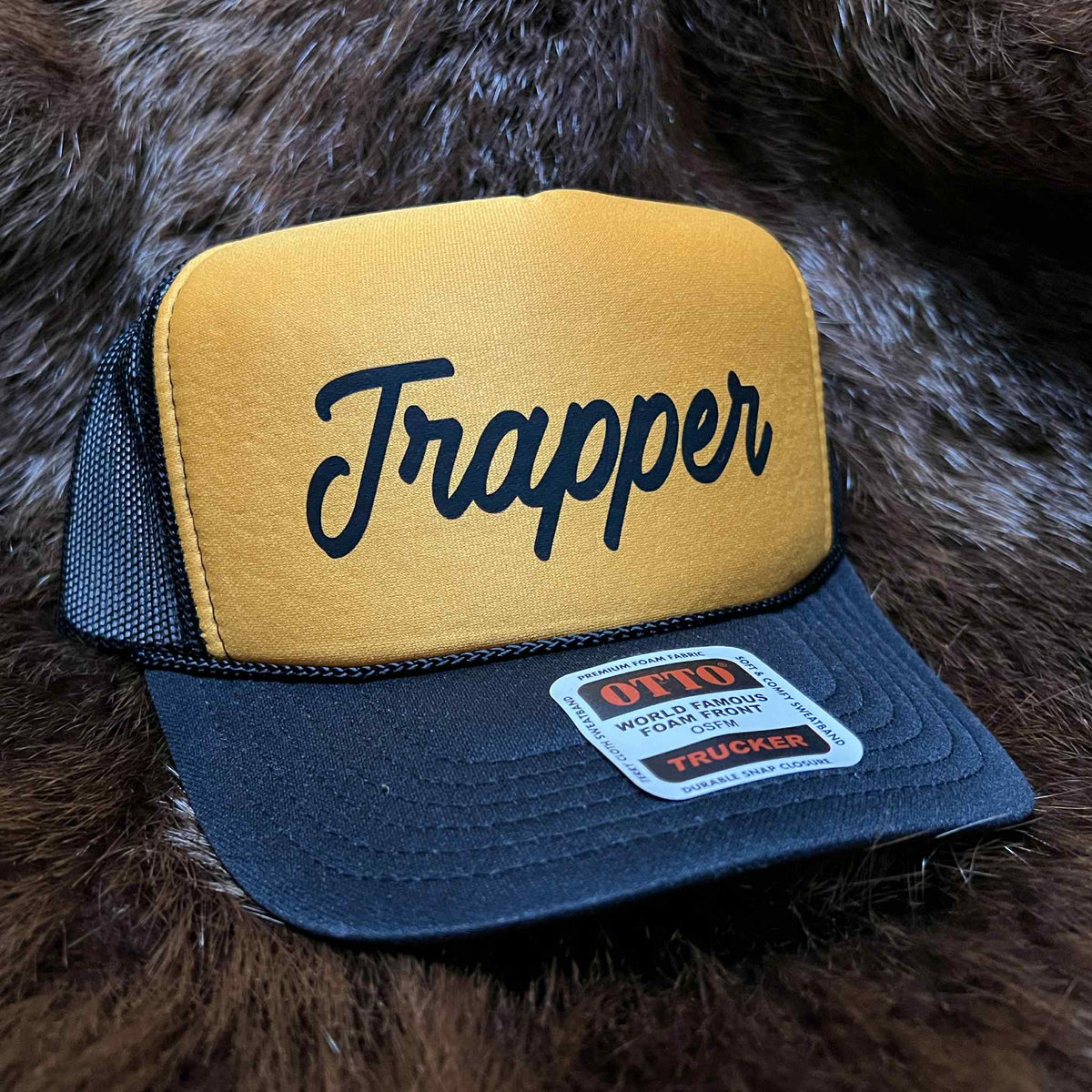 Black/Gold Trucker Style TRAPPER Hat